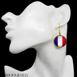 Boucles d'oreilles dorées France sous cabochon en résine