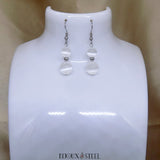 Boucles d'oreilles pendantes deux perles de sélénite en pierre naturelle et acier argenté