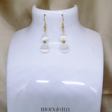 Boucles d'oreilles pendantes deux perles de sélénite en pierre naturelle et acier doré