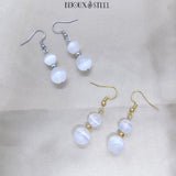 Boucles d'oreilles pendantes doubles perles de sélénite