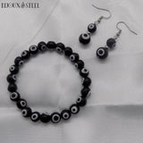 Bracelet 8mm et boucles d'oreilles argentées en perles mauvais oeil noires et blanches