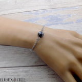 Bracelet acier argenté à perle d'obsidienne flocon de neige en pierre naturelle et acier inoxydable