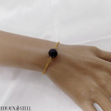 Bracelet doré à perle d'obsidienne en acier inoxydable et pierre naturelle
