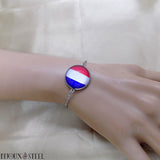 Bracelet drapeau de la France sous cabochon en résine et acier inoxydable argenté