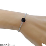 Bracelet en acier chirurgical argenté et sa perle de tourmaline noire 8mm
