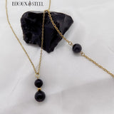 Bracelet et collier à pendentif en acier inoxydable doré et perles en obsidienne noire
