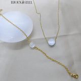 Bracelet et collier dorés à perle de sélénite en pierre naturelle et acier inoxydable