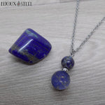 Collier argenté à pendentif double perles de lapis-lazuli
