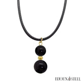 Pendentif doré deux perles en obsidienne noire et son cordon noir