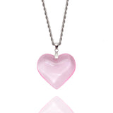 Collier chaîne torsadée argentée et son pendentif coeur rose en verre et acier inoxydable