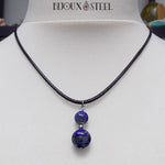 Collier cordon noir à pendentif argenté deux perles de lapis-lazuli