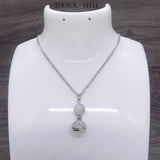 Collier deux perles en quartz à inclusion de tourmaline noire et sa chaîne argentée en acier inoxydable