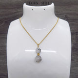 Collier deux perles en quartz à inclusion de tourmaline noire et sa chaîne dorée en acier inoxydable
