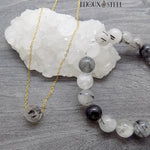 Collier doré et bracelet en pierre de quartz tourmaline