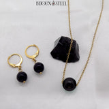 Collier et boucles d'oreilles anneaux dorés en acier inoxydable et pierre d'obsidienne noire