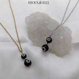 Colliers à pendentifs doubles perles mauvais oeil noir et blanc