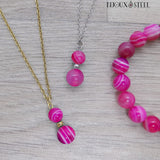 Colliers deux perles d'agate magenta accompagné d'un bracelet en pierre d'agate magenta