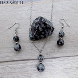 Parure argentée boucles d'oreilles pendantes et collier à pendentif en obsidienne flocon de neige