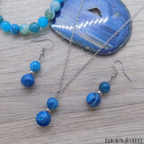 Parure argentée deux perles d'agate bleue et acier inoxydable