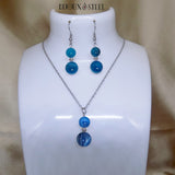 Parure collier et boucles d'oreilles argentés deux perles en agate bleue teintée et acier inoxydable