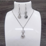 Parure boucles d'oreilles et collier deux perles en pierre de quartz tourmaline et acier inoxydable argenté