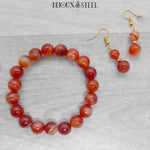 Parure bracelet et boucles d'oreilles en agate rouge