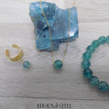 Parure collier et bijoux dorés en pierre de fluorite bleue et acier inoxydable