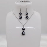 Parure mauvais oeil noir et blanc en acrylique et acier inoxydable