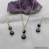 Parure mauvais oeil noir et blanc en acrylique et acier inoxydable