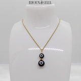 Pendentif doré deux perles mauvais oeil noir et blanc en acier inoxydable