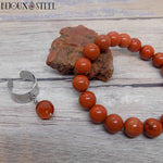 Bague ajustable argentée et bracelet en perles de jaspe rouge 10mm