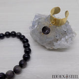 Bague femme dorée ajustable à perle d'obsidienne argentée et bracelet en perles d'obsidienne argentée