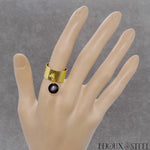 Bague dorée ajustable à pendentif perle d'obsidienne oeil céleste en pierre naturelle et acier chirurgical