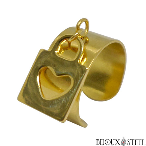 Bague large pampille réglable dorée à pendentif coeur enfermé dans son cadenas en acier
