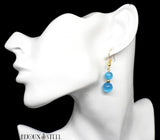 Boucles d'oreilles pendantes deux perles d'oeil de chat bleu en verre et acier inoxydable doré