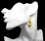 Boucle d'oreille pendante dorée deux perles d'oeil de tigre caramel en pierre naturelle et acier inoxydable