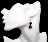 Boucles d'oreilles pendantes argentées deux perles d'onyx noir en pierre naturelle et acier chirurgical