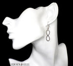 Boucles d'oreilles pendantes argentées symbole infini en acier chirurgical