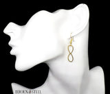 Boucles d'oreilles pendantes dorées symbole infini en acier chirurgical