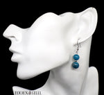 Boucles d'oreilles pendantes argentées deux perles d'apatite bleue 