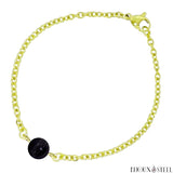 Bracelet à perle d'agate noire à rayures 8mm sur sa chaîne dorée en acier inoxydable