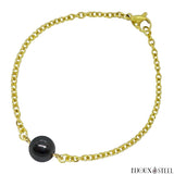 Bracelet à perle d'hématite 10mm et sa chaîne dorée en acier chirurgical