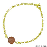 Bracelet à perle en pierre du soleil 10mm sur sa chaîne dorée en acier inoxydable