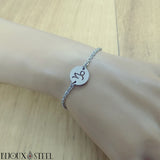 Bracelet argenté signe astrologique capricorne en acier chirurgical