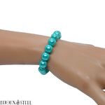 Bracelet élastique de perles nacrées turquoise 10mm