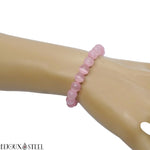 Bracelet élastique en perles d'oeil de chat rose en verre 7mm