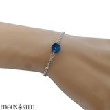 Bracelet en acier chirurgical argenté et sa perle d'agate bleue teintée 8mm