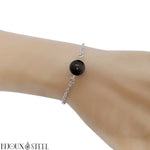 Bracelet à fine chaine argentée en acier chirurgical et sa perle d'obsidienne argentée 10mm en pierre naturelle