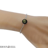 Bracelet en acier inoxydable argenté et sa perle d'obsidienne dorée 10mm