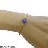 Bracelet en acier chirurgical doré et sa perle d'aventurine bleue 8mm